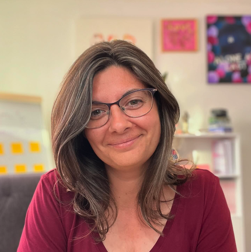 andreea sandu at her desk